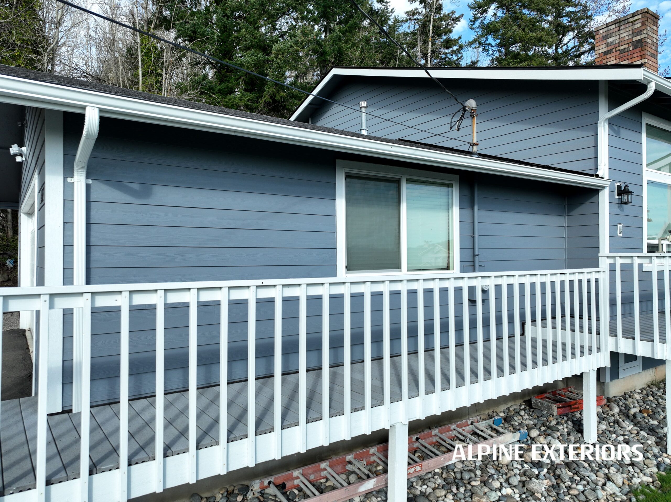 Low slope roof replacement – bellingham, wa – new low slope gaf roof installed for better drainage and leak prevention in bellingham residential area.